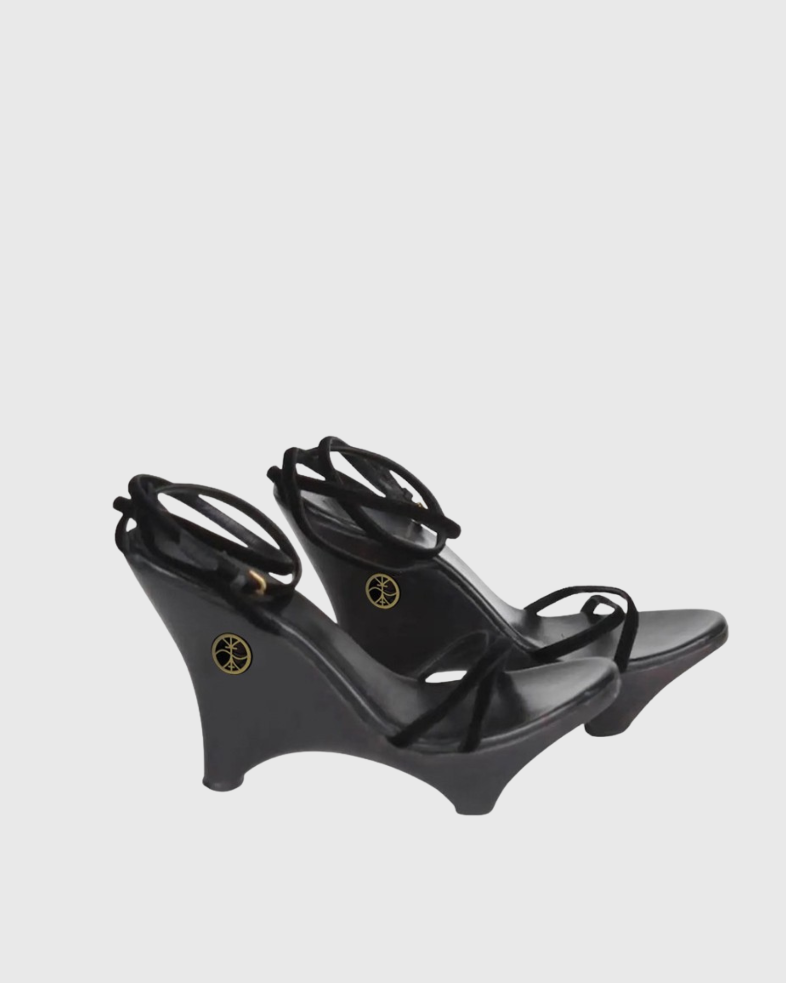 Daryl Sculptural Wedge Heels In Black