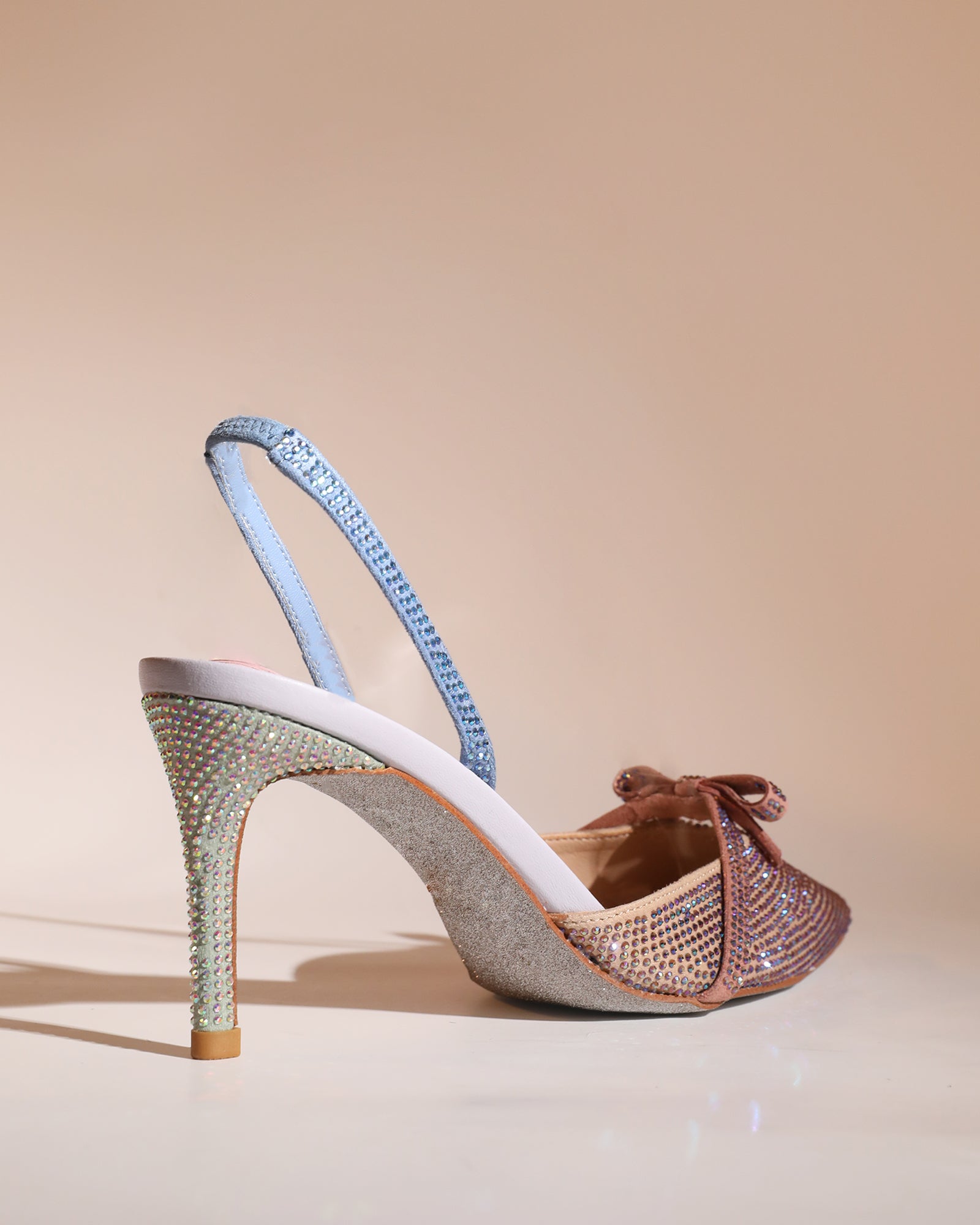 Easton Bow Rhinestone Slingback Pumps In Champagne