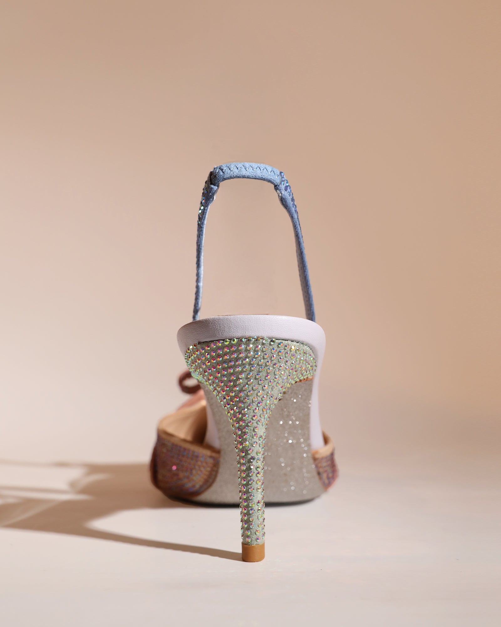 Easton Bow Rhinestone Slingback Pumps In Champagne