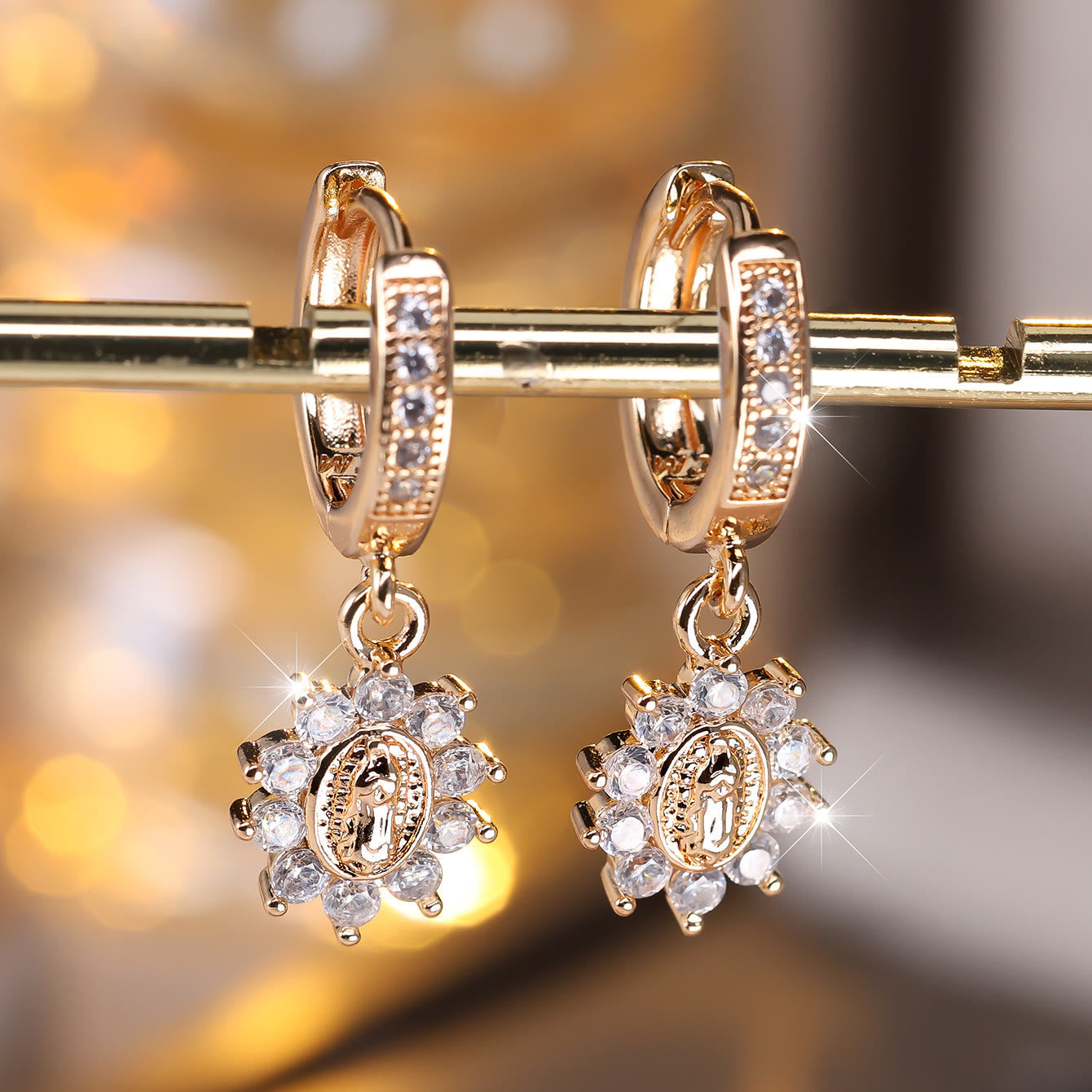 Our Lady Zircon Halo Huggie Earrings with Sunburst Pendant